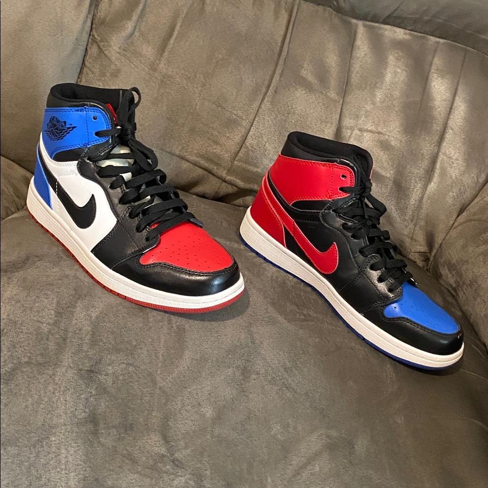 Nike Air Jordan 1 High OG in Red, Black, Blue, and White.